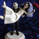 Illustration for article titled Nerdiest Wedding Cake Toppers We Adore